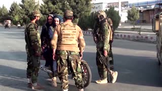 Taliban man checkpoints around Kabul airport