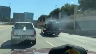 Flatbed Truck Tows Flaming Car