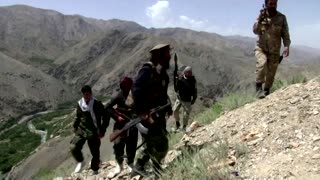 Afghan civilians prepare to fight the Taliban