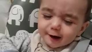 Baby tries lemon for the first time!