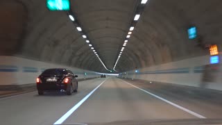 In a car passing through a tunnel 4