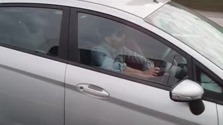 Couple Driving Caught in the Act