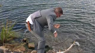 Man Catches Fish Moments Before Wedding