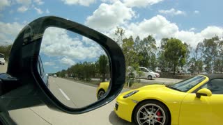 Yellow Sports Car in the mirror