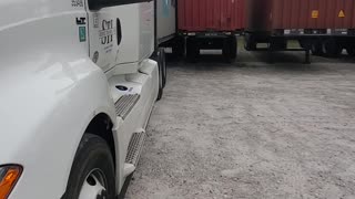 Semi Squeezes Into Tight Spot to Weather Storm