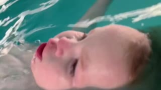 1-year-old jumps into pool, floats on his back
