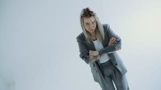 Woman with Tattoo in Business Attire