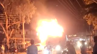 Driver Takes Flaming Tractor away from Town