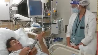Doctor sings ukulele duet with her patient