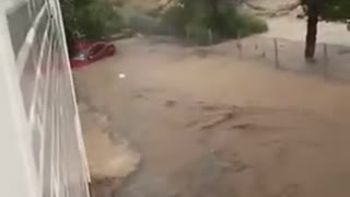 Person Witnesses Damage Caused To Apartment Complex By Flash Flood On Video Call