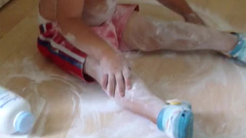 Little one gets caught with baby powder