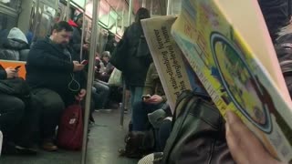 Drunk guy on subway train yells about living with a fat guy