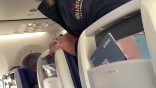 Airline Passengers Argue Over Seating Positions