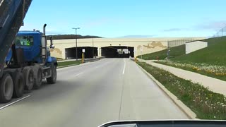 Tunnel Removes Raised Dump Truck Bed