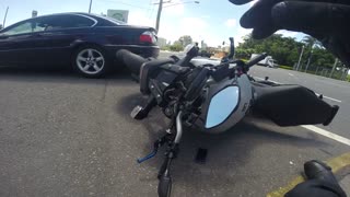 Distracted Motorcycle Rider Rear Ends Car