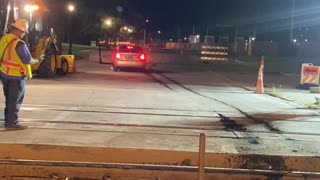 Car Drives Over a Train Track that's Under Construction Twice
