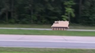 Police Chase Tank down Highway