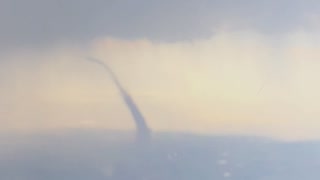 Tornado Captured from Airplane Window