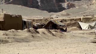 Afghans flee Taliban sweep of provinces