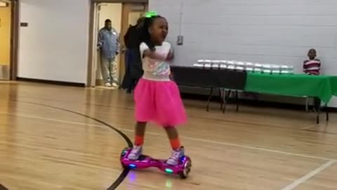 Little girl shows off hoverboard dance moves