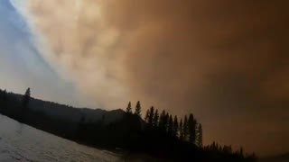 Smoke completely covers Bass Lake in California