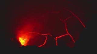 larva erupting from the crater of a volcano