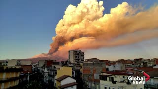 Italy's Mount Etna fills sky with orange smoke after eruption