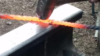 Black smithing twisting metal part 3
