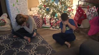 Kids surprised with Golden Retriever puppy for Christmas