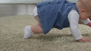 Baby girl crawling first time