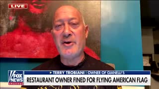 Restaurant owner fined for flying American flag