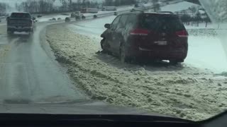 Snow Storm Causes Mass Highway Slide-Offs
