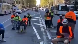 Aussie construction workers blocked off the road