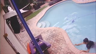 Floridian Falls in Pool with Phone