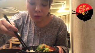 Japanese girl eat seafood bowl at Japanese izakaya