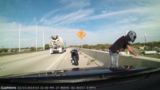 Motorcycle Crash Causes Rider to Plummet Over Guardrail