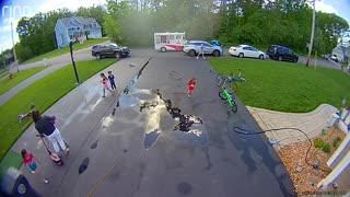 Mom on Scooter Takes a Spill