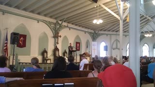Pastor Ken Graves preaching the Gospel of Jesus Christ.