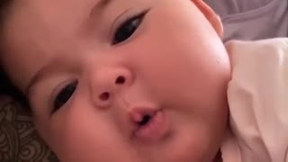 Sweet Baby Becomes Super Adorable For The Camera