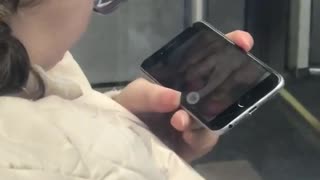 Woman watches nasty pedicure video on her phone