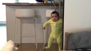 Baby "floats" when tied to many balloons