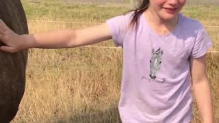 Girl Sheds Tears of Joy over Her Horse
