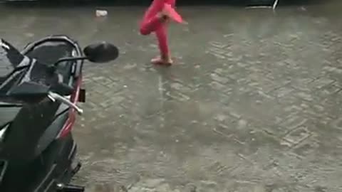 Little Girl Experiences Her Rainfall with special way