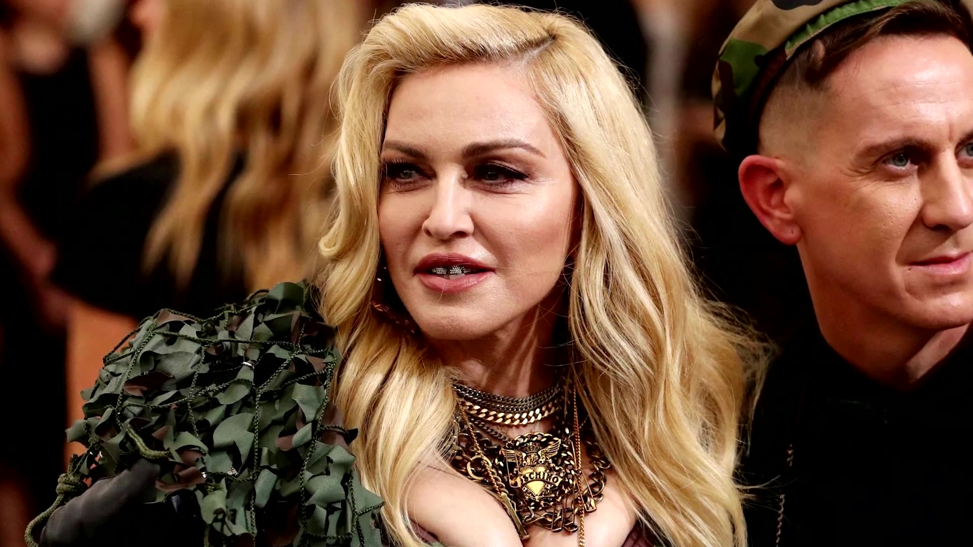 Madonna postpones tour after hospitalization