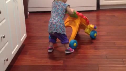 Baby's first time wearing shoes proves to be adorably difficult