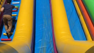 Daughter on Slide Takes a Dive