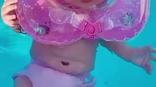 beautiful baby swimming