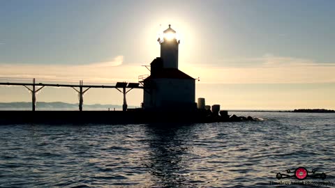 Stunning winter drone footage of Lake Michigan lighthouse