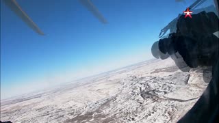 Hot Shot Russian Troops Parachute From Helicopter
