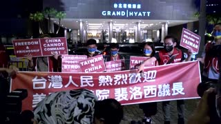 Taiwanese show support for Pelosi outside hotel